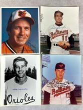(4) Signed 8 x 10 Photos - B. Robinson, Aparico, and 2 other Baltimore Orioles