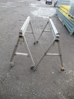 (2) METAL SAWHORSES ON CASTERS