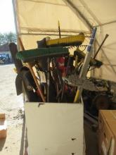 METAL TOTE W/ TAMPER, EDGER, POST HOLE DIGGER, & ASSORTED BROOMS, SHOVELS, RAKES, GARDEN WEED HOES,
