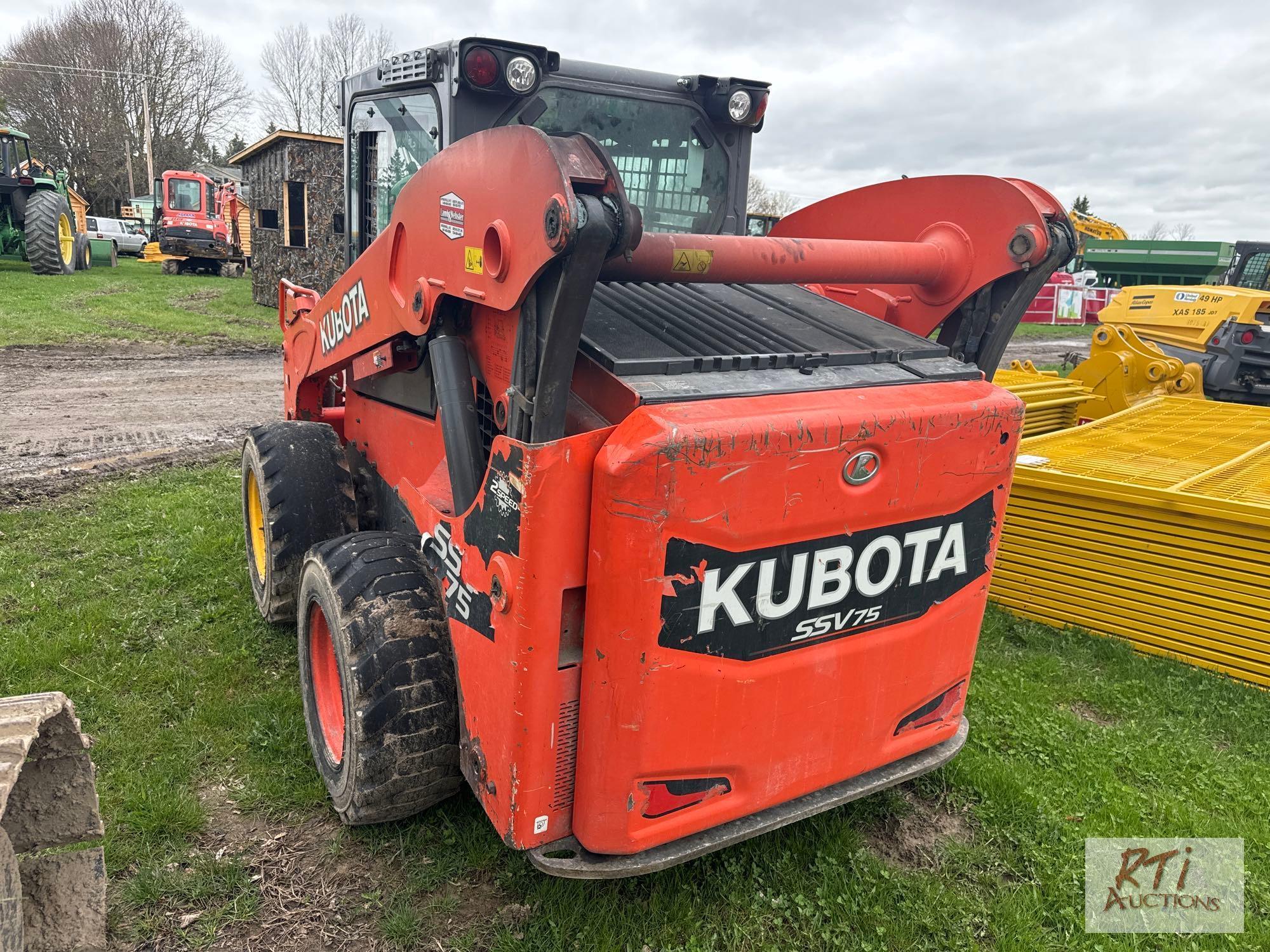 Kubota SSV75 skid loader, hand and foot control, power wedges, 2-speed, cab, heat, A/C, 8805 hrs.