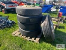 Pile of (5) 11R 22.5 tires and wheels, 2 aluminum, 3 steel