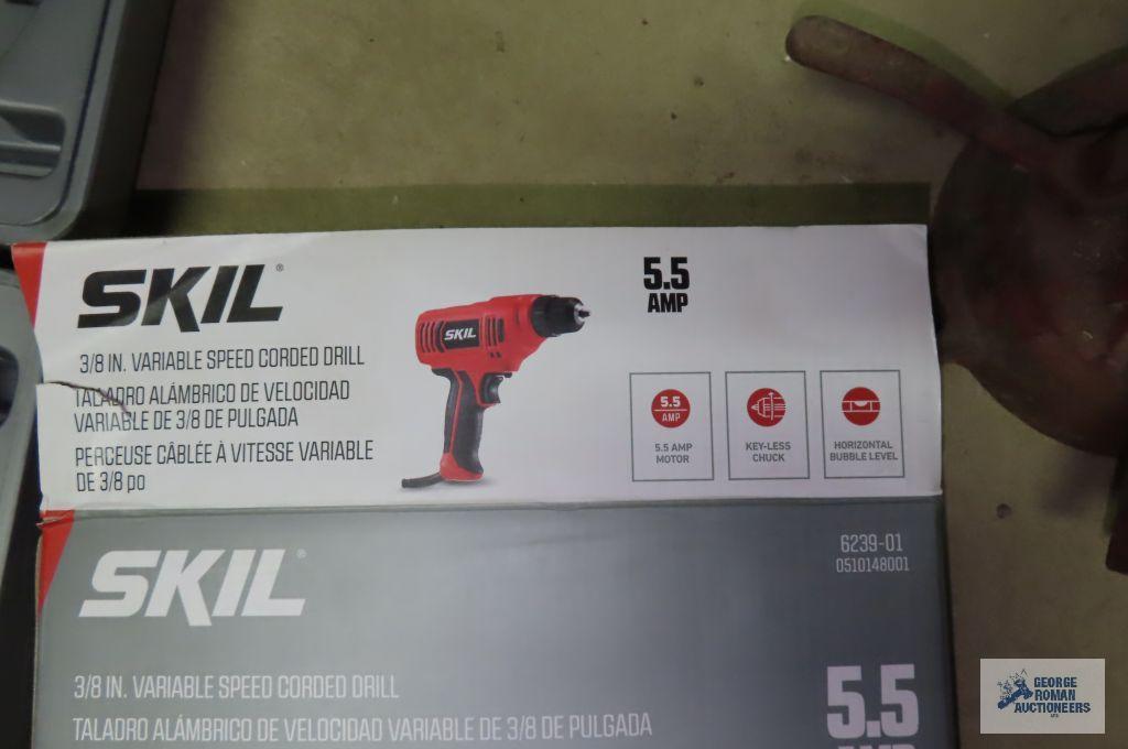 Skil 5.5 amp variable speed drill. Ryobi 12 volt cordless drill. includes two batteries, charger and