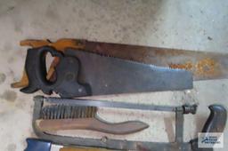 lot of saws, heavy duty crowbar and etc