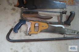 lot of saws, heavy duty crowbar and etc