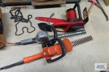 Two electric hedge trimmers and saw parts