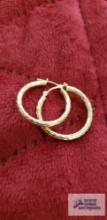 Gold colored hoop earrings, marked 585, approximate total weight is 1.13 G