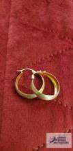 Gold colored hoop earrings, marked 10K, approximate total weight is 1.79 G