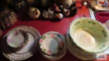 Variety of vintage dishes, plates, and saucers