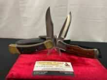 Pair of Buck Folding Hunting Knives, models 110 Hunter & 532 BuckLock, Wooden handles