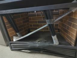 GAS FIREPLACE INSERT, UNIT APPEARS NEW WITH DEFECTS, HEAVY DENTS TO THE BOTTOM VENT SEE PHOTOS,