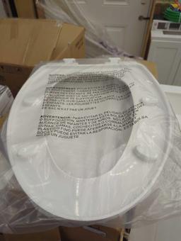 NON MARKED ELONGATED TOILET SEAT, N2450 MARKED BOX, UNIT APPEARS SEALED IN BAG, ESTIMATED MSRP 40.00