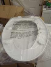 NON MARKED ELONGATED TOILET SEAT, N2450 MARKED BOX, UNIT APPEARS SEALED IN BAG, ESTIMATED MSRP 40.00