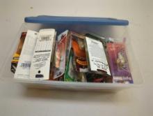 Blue Sterilite organizer tote and contents including various fishing lures of similar style. Comes