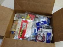 Box and contents including fishing lures and other fishing accessories. Comes as is shown in photos.