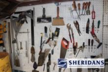 ASSORTED TOOLS HANGING ON PEGBOARD AS SHOWN IN PICTURE.