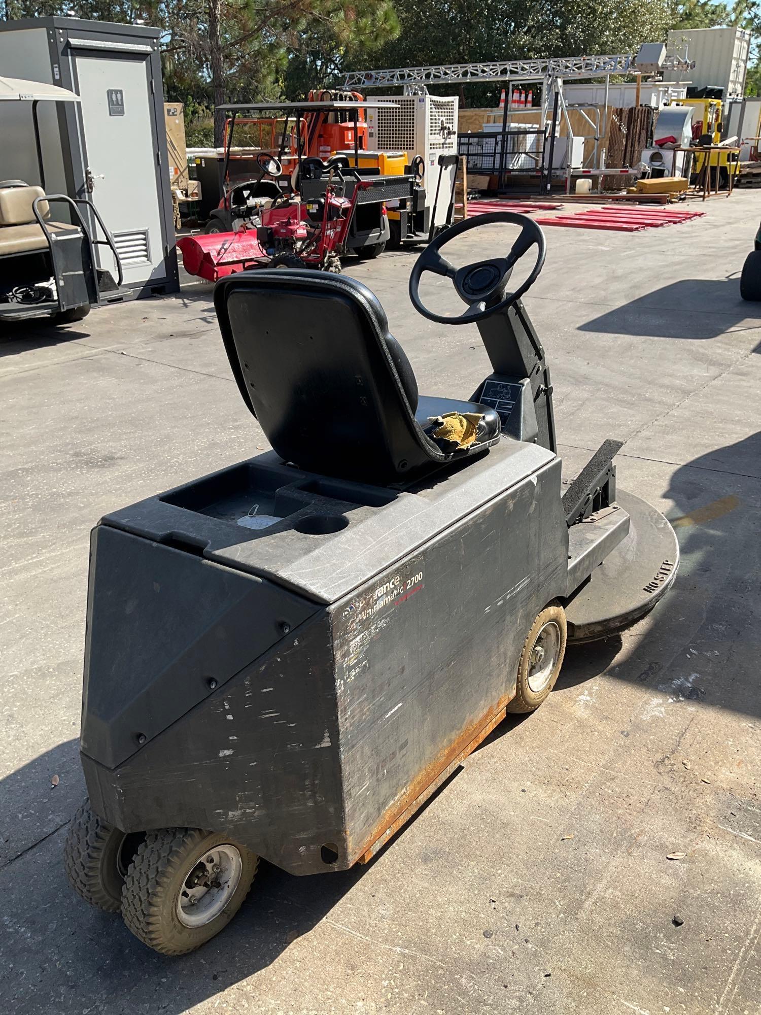 NILFISK ADVANCE WHIRLMATIC RIDE ON FLOOR BURNISHER MODEL 2700, ELECTRIC, 36 VOLTS, RUNS AND OPERA...