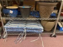 Pots, planters, lounge chair cushions, fold up chair