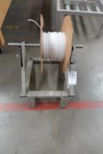 ROLL OF TUBING W/STAND