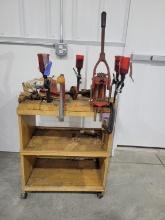 Reloading Equipment & Stand Wooden stand with cast wheels, comes with reloading equipment and powder