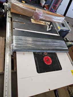 Rigid table saw with router attachment
