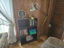 Bookcase with Books, Decor, Picture Frames and Floor Lamp