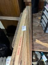 Pile of antique yardsticks wood